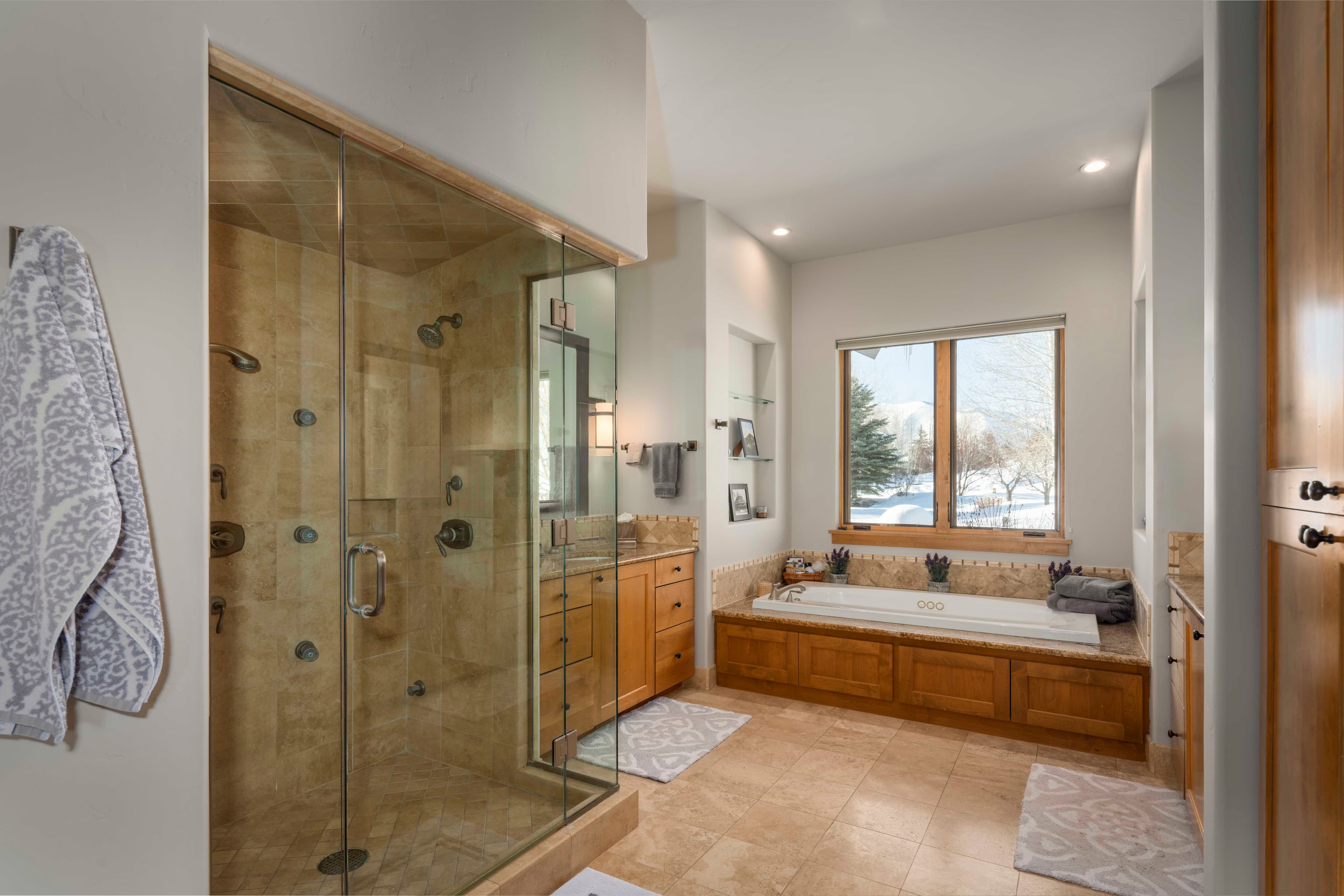 Spacious and bright, the primary is the perfect area to unwind after a long day on the slopes